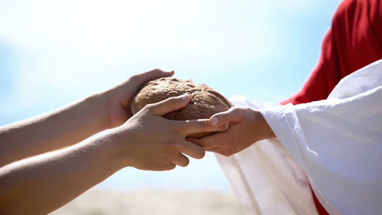 How do Christians interpret the story of the Feeding of the 5,000?